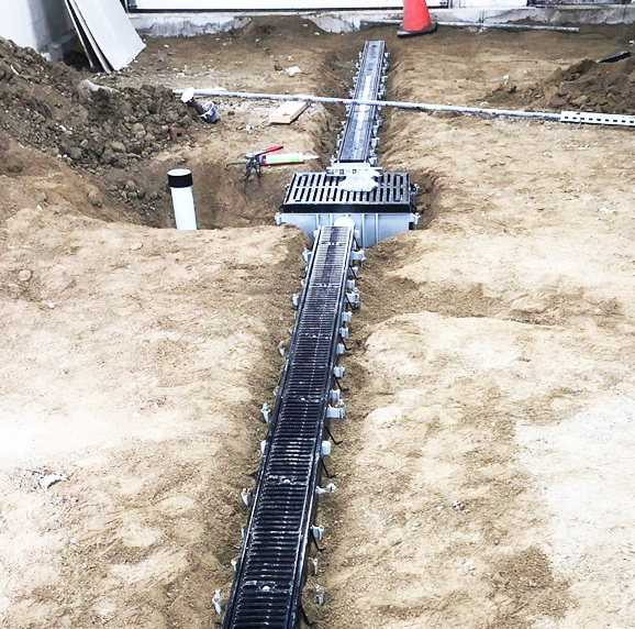 pre-sloped-trench-drain-installation
